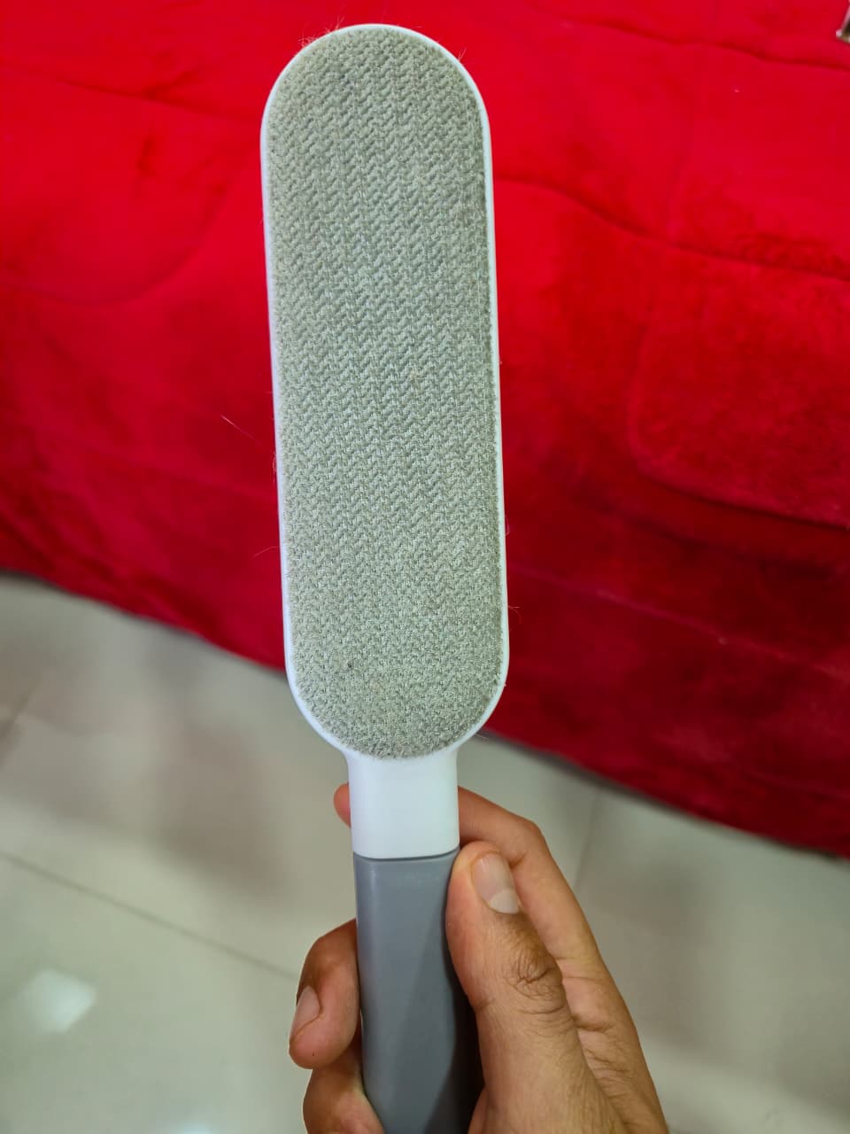 Cepillo para quitar pelos en la ropa